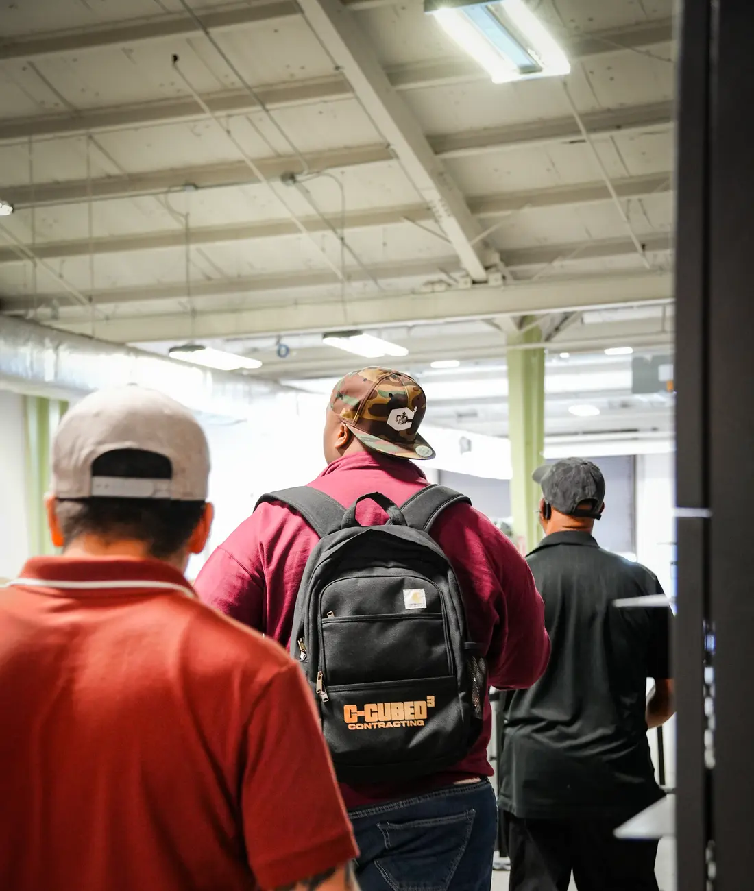 C-Cubed Contracting crew walking into a commercial job site