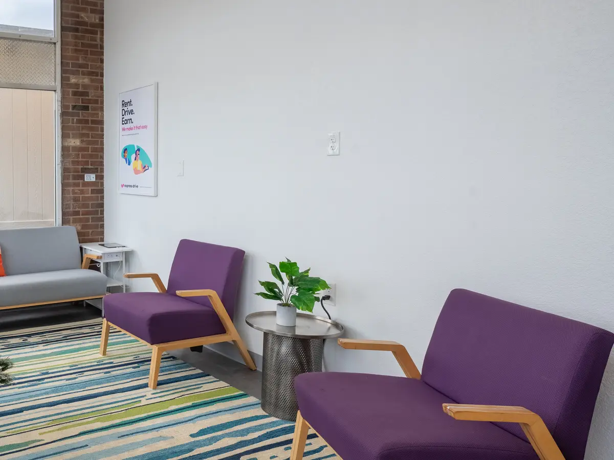 Finished client seating area with new flooring, wall finishes and lighting