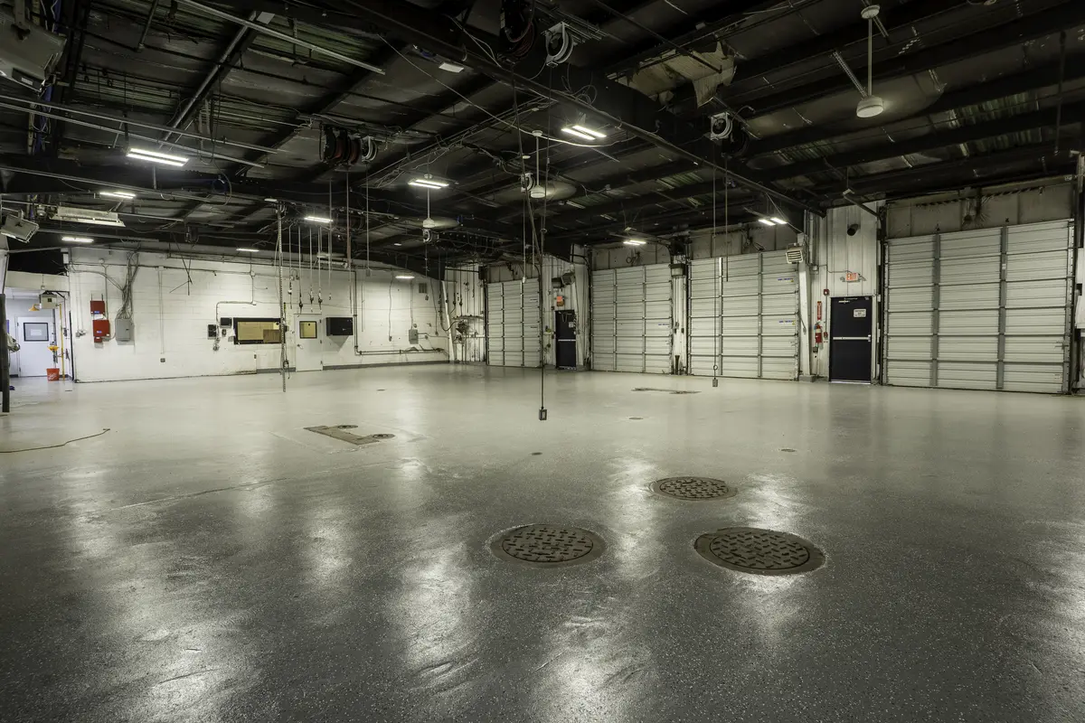 Cleared industrial bay prepared for a facility improvement project